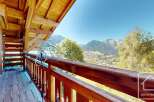 Enjoy breathtaking mountain views from this stunning balcony.
