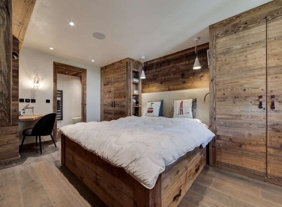 Experience rustic elegance in this stunning bedroom.