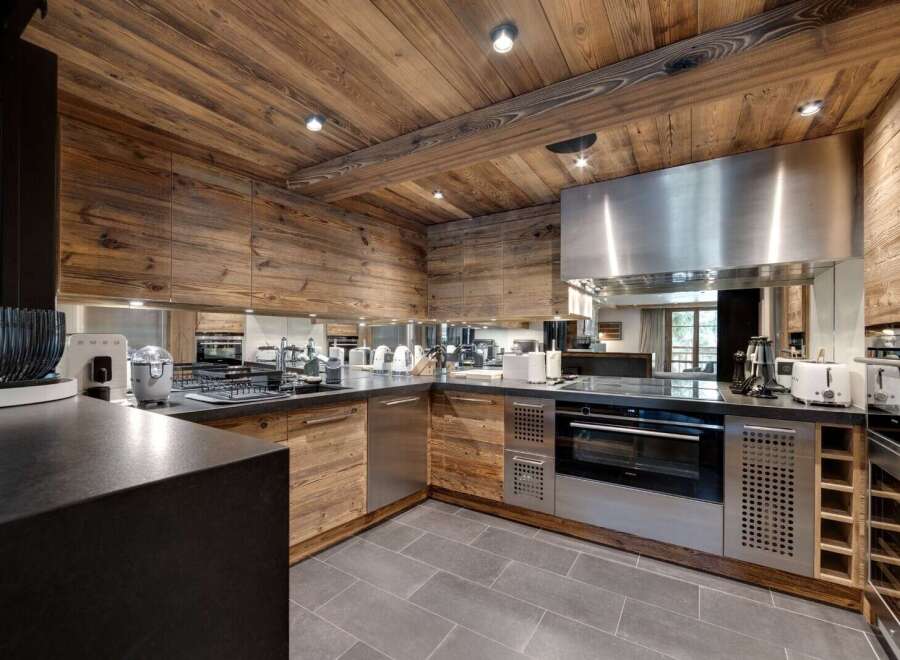 This stunning kitchen boasts a rustic yet modern design, perfect for any home.