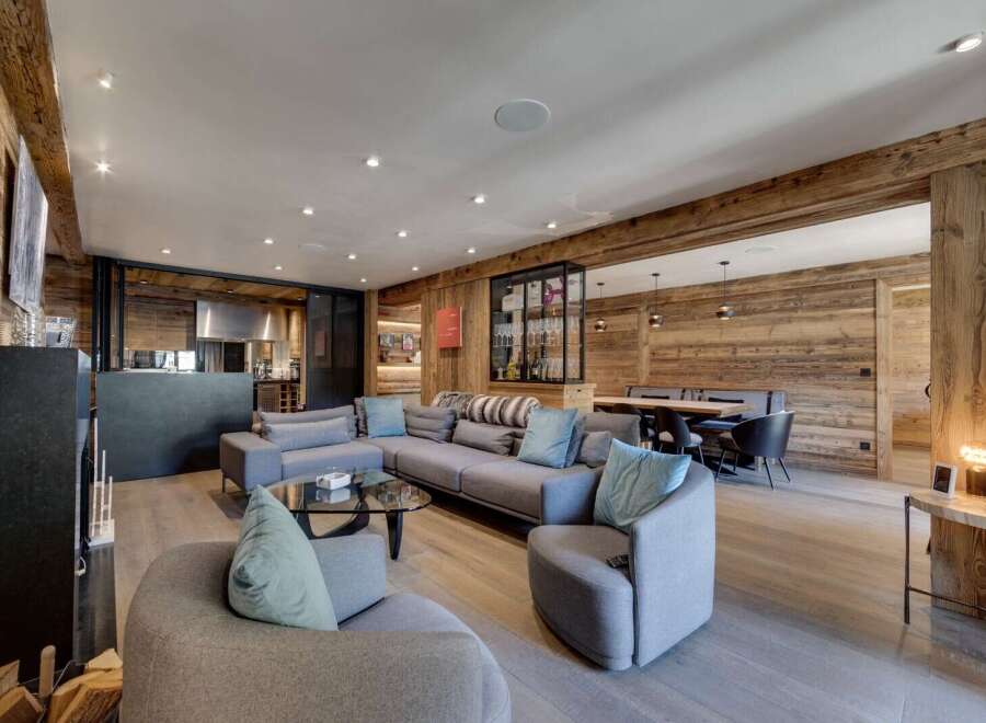 Experience luxury living in this stunning property, featuring a spacious living area with a modern design.