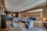 Experience luxury living in this stunning property, featuring a spacious living area with a modern design.