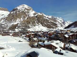 Nestled in a picturesque mountain village, this property offers stunning views of snow-capped peaks.