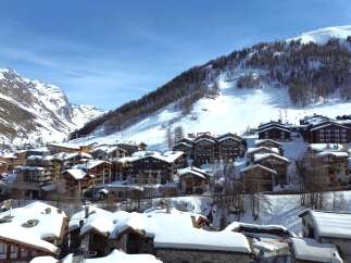 Discover the charm of this stunning mountain property, nestled in a picturesque ski village.