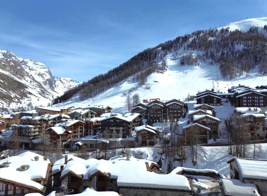 Discover the charm of this stunning mountain property, nestled in a picturesque ski village.