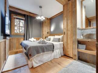 Experience rustic elegance in this stunning bedroom.