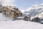 Experience luxury living in this stunning mountain chalet, nestled in a picturesque winter wonderland.
