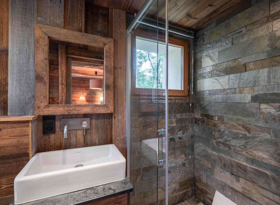 Experience rustic elegance in this stunning bathroom.