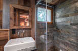 Experience rustic elegance in this stunning bathroom.