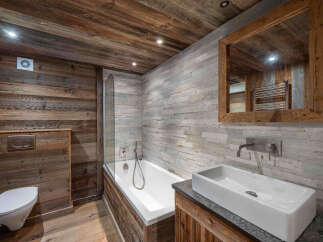 Experience rustic elegance in this stunning bathroom.