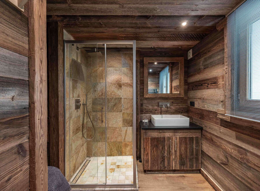 Experience rustic elegance in this stunning bathroom.