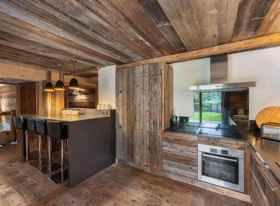 Experience rustic elegance in this stunning kitchen.