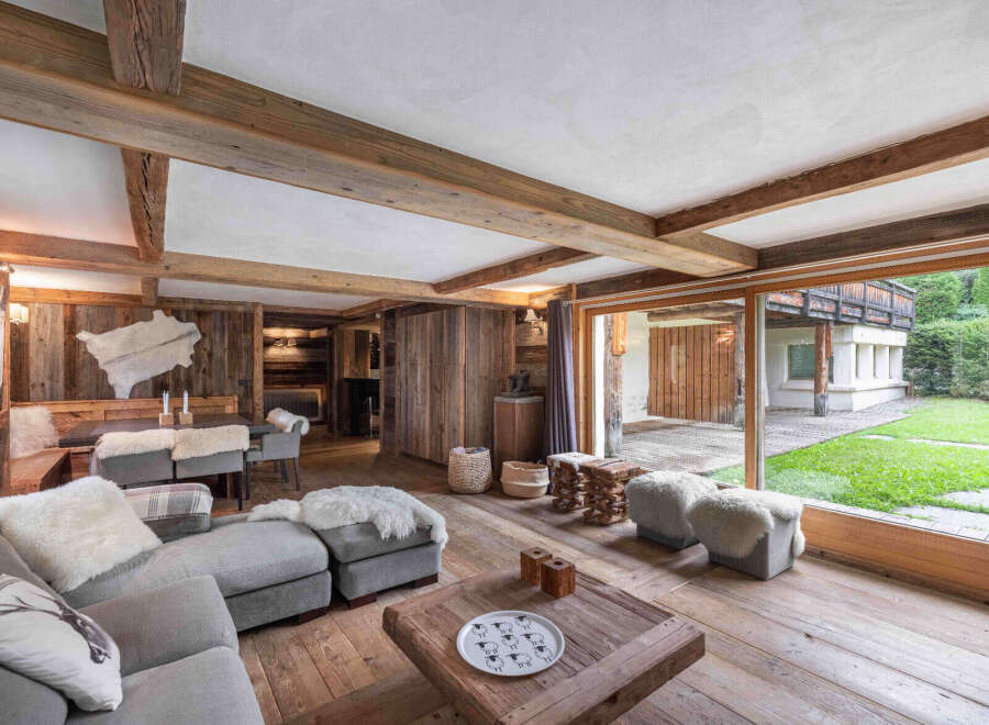 Experience rustic elegance in this stunning property, featuring exposed wooden beams and a cozy, inviting atmosphere.