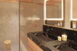 Experience luxury and modern design in this stunning bathroom.
