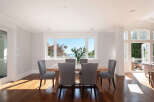 Experience luxury living in this stunning dining room, perfect for hosting gatherings.