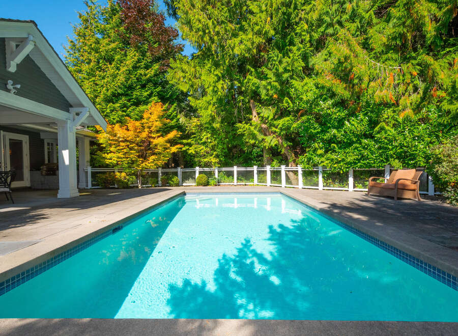 Enjoy the ultimate outdoor oasis with this stunning property featuring a sparkling swimming pool.