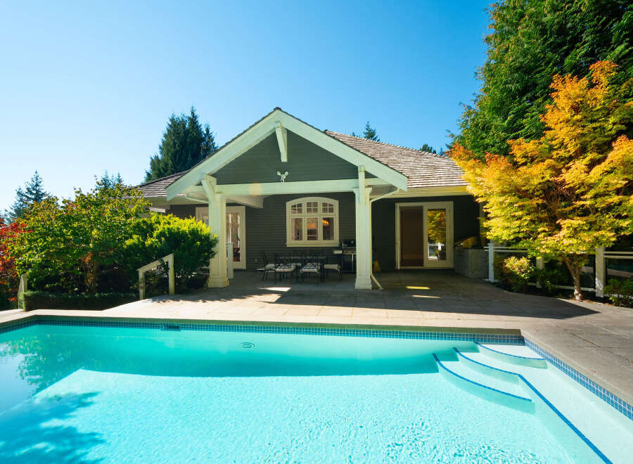 Enjoy the ultimate in luxury living with this stunning property featuring a private pool and a beautifully designed outdoor patio.