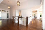 Step into luxury with this stunning home featuring a grand entrance and exquisite hardwood floors.