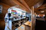 Step into a charming commercial space with a rustic, inviting atmosphere.