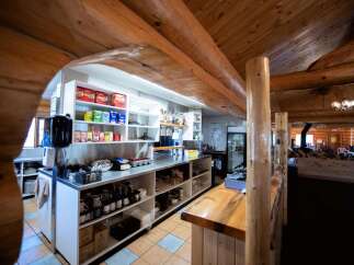 Step into a charming commercial space with a rustic, inviting atmosphere.