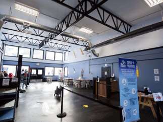 This spacious interior showcases a welcoming ticket sales area, perfect for a ski resort or recreational facility.