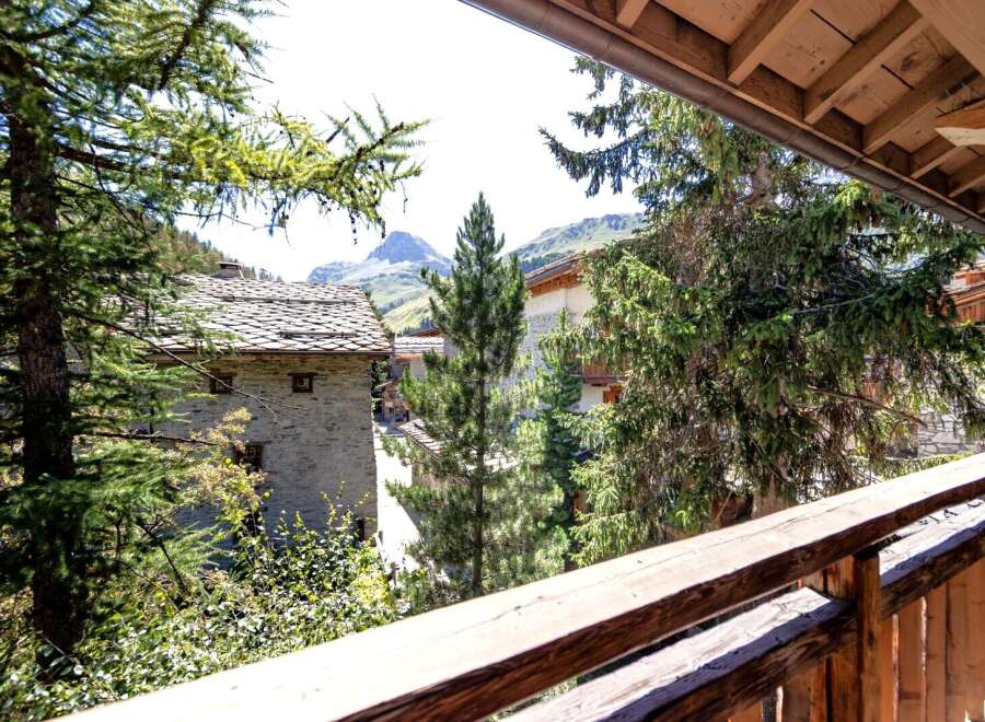 Enjoy breathtaking mountain views from this charming property.