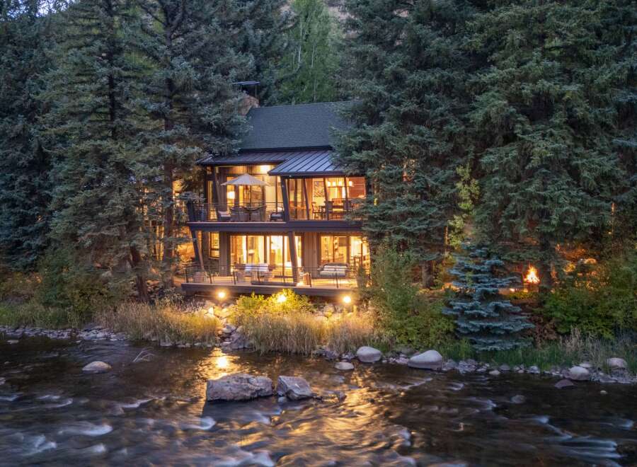 Nestled amidst lush greenery, this stunning property offers a serene escape.