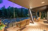 Experience the tranquility of riverside living with this stunning property.