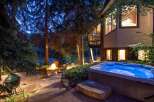 Experience luxury living in this stunning property featuring a private hot tub, perfect for unwinding after a long day.