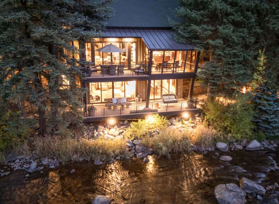 Nestled amidst lush greenery, this stunning property offers a serene escape with its modern design and inviting ambiance.