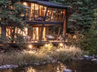 Nestled amidst lush greenery, this stunning property offers a serene escape with its unique design and prime location.