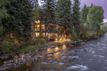 Nestled amidst lush greenery, this stunning property offers a serene escape with its riverfront location.