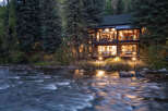Nestled amidst lush greenery, this stunning property offers a serene escape with its riverfront location.