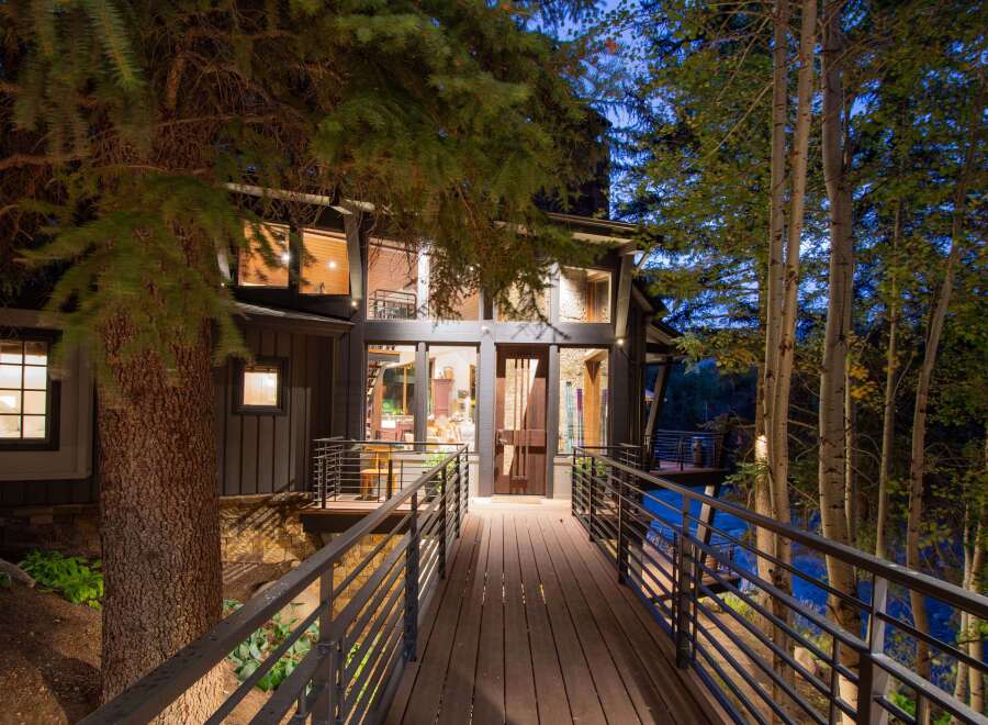 Nestled amidst lush greenery, this stunning property offers a serene escape.