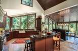 This stunning kitchen boasts a seamless blend of rustic charm and modern elegance.