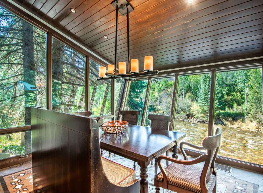 Experience the tranquility of nature in this stunning dining room.