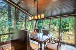 Experience the tranquility of nature in this stunning dining room.