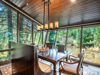 Experience the tranquility of nature in this stunning dining room.