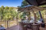 Enjoy breathtaking views from this stunning property overlooking a flowing river.