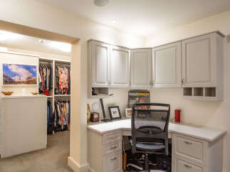 This stunning property boasts a beautifully designed home office, perfect for remote work or creative endeavors.