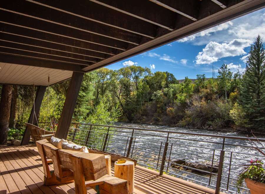 Experience the tranquility of riverside living in this stunning property.