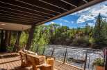 Experience the tranquility of riverside living in this stunning property.
