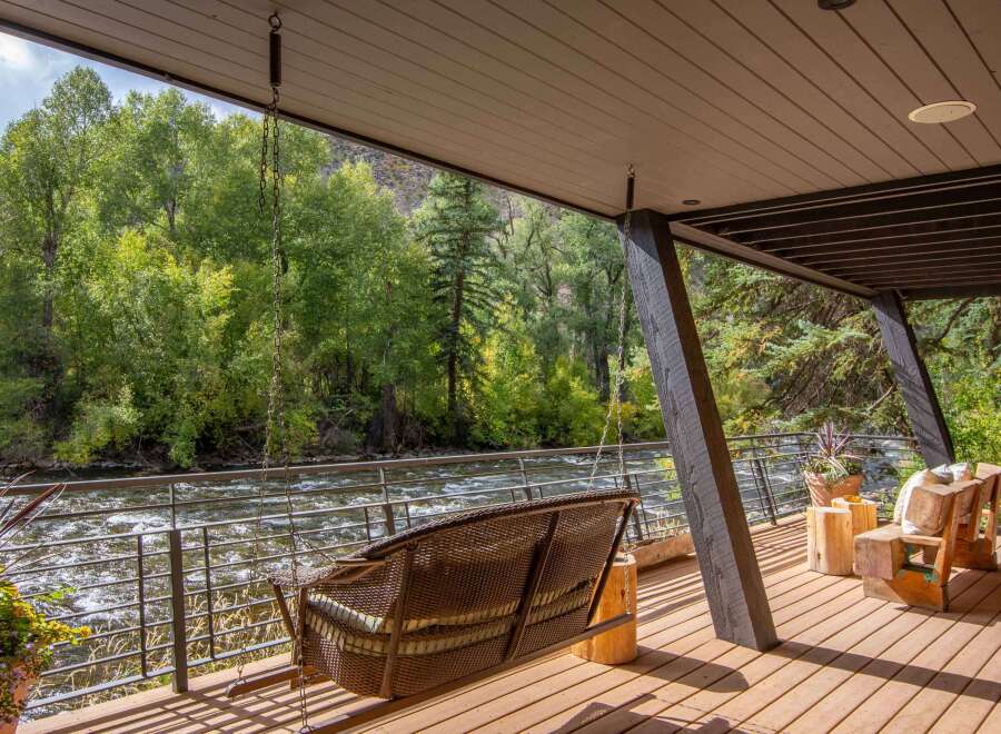 Experience the tranquility of riverside living in this stunning property.