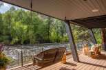 Experience the tranquility of riverside living in this stunning property.