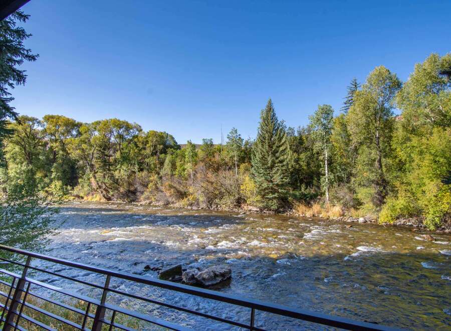 Enjoy breathtaking views of the river from this stunning property.