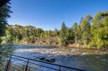 Enjoy breathtaking views of the river from this stunning property.