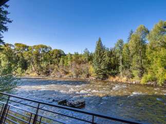 Enjoy breathtaking views of the river from this stunning property.