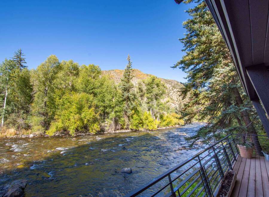 Experience the tranquility of riverside living in this stunning property.