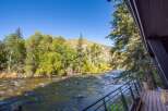 Experience the tranquility of riverside living in this stunning property.