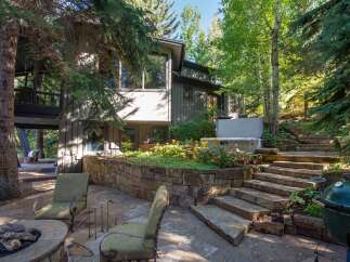 This stunning property boasts a beautiful outdoor space, perfect for entertaining or relaxing.