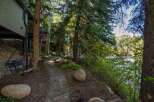 Escape to your dream home nestled in a serene, wooded setting.